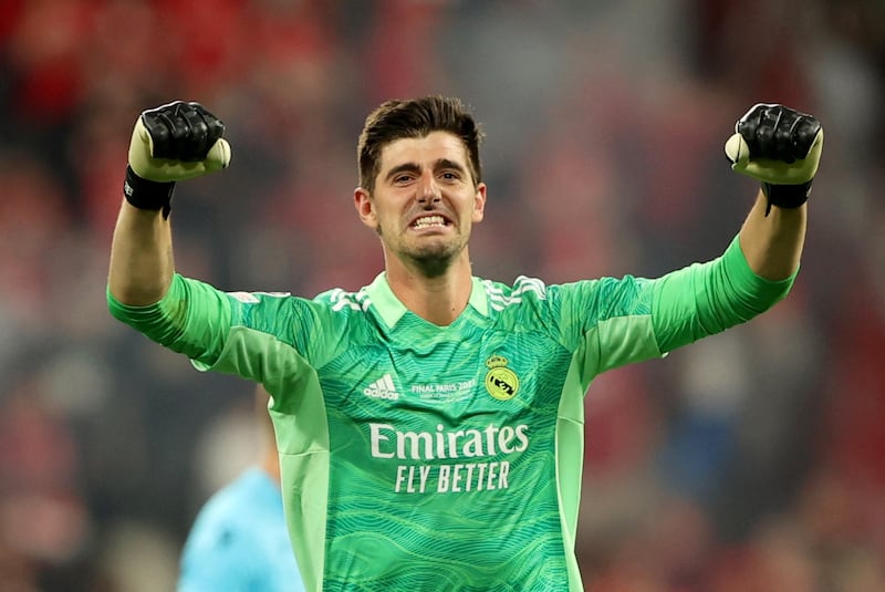 Real Madrid goalkeeper Thibaut Courtois celebrates winning the Champions League. Reuters