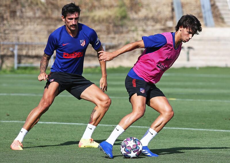 Stefan Savic and Joao Felix. EPA