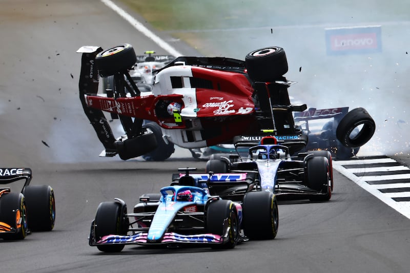 Zhou Guanyu's Alfa Romeo crashes at the start of the British GP  at Silverstone on Sunday, July 3, 2022. Getty