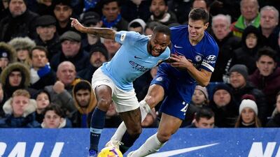 Manchester City's Raheem Sterling, left, was the target of racist abuse from Chelsea fans during the Premier League match at Stamford Bridge in December 2018. EPA