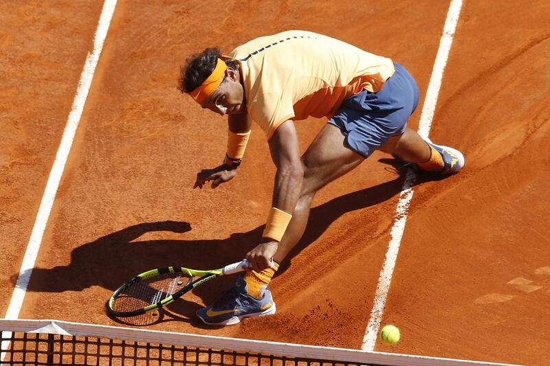 Spain’s Rafael Nadal returns the ball to Britain’s Andy Murray during the Monte-Carlo ATP Masters Series Tournament semi final match, on April 16, 2016 in Monaco. AFP PHOTO / VALERY HACHE