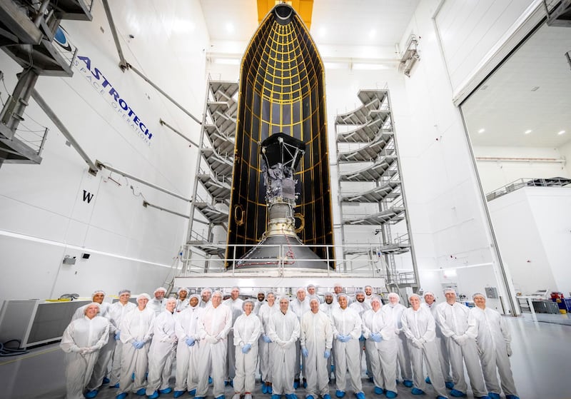 A photo made available by NASA shows the team behind the Parker Solar Probe (PSP) posing for a group photo in front of the probe, at Astrotech Space Operations. EPA/NASA