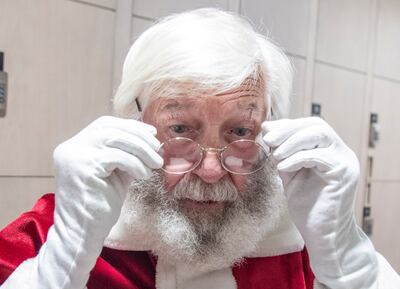 Bill Martin is so committed to his Santa Claus duties that he starts growing his beard from mid-June. Ruel Pableo / The National

