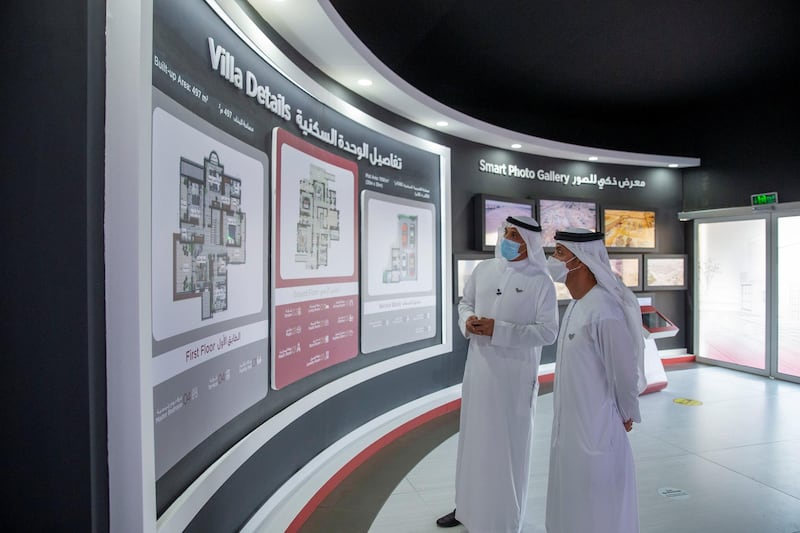 AL SAMHA, ABU DHABI, UNITED ARAB EMIRATES - October 21, 2020: HH Sheikh Hazza bin Zayed Al Nahyan, Vice Chairman of the Abu Dhabi Executive Council (R)  tours Emirati Housing Neighborhood, in Al Samha City. 

( Mohamed Al Baloushi for the Ministry of Presidential Affairs )
---