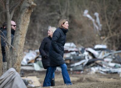 Iowa Governor Kim Reynolds surveys the tornado-ravaged areas of Winterset. AP