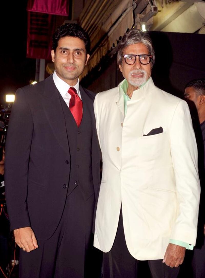 Abhishek Bachchan and his father Amitabh. AFP