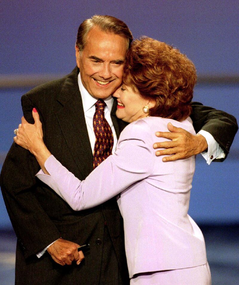 Presidential nominee Bob Dole hugs wife Elizabeth in August 1996 at the Republican National Convention. Reuters