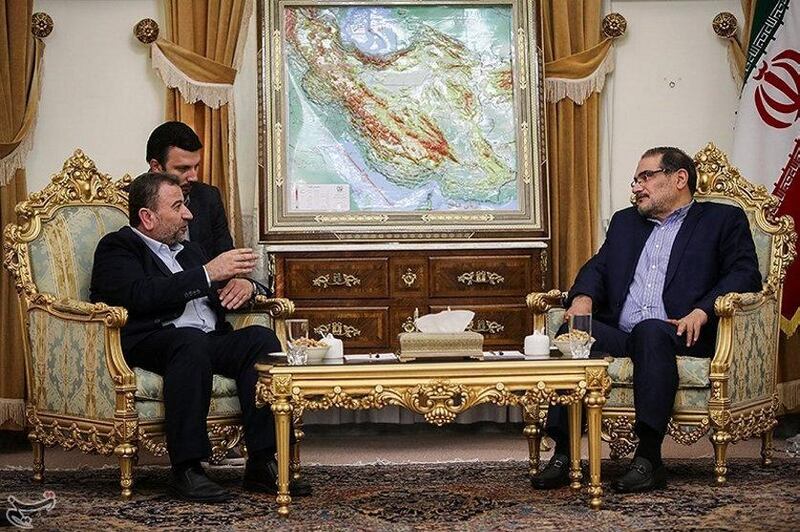 Saleh al-Arouri (L), Hamas deputy chief, meets with Ali Shamkhani, secretary of Iran's National Security Council, in Tehran, Iran October 21, 2017. Tasnim News Agency/Handout via REUTERS ATTENTION EDITORS - THIS PICTURE WAS PROVIDED BY A THIRD PARTY. NO RESALES. NO ARCHIVE.