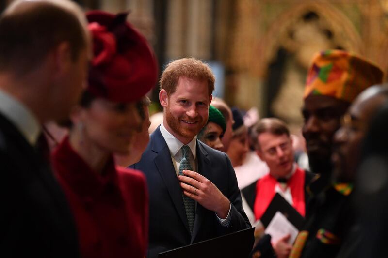 Prince Harry, Duke of Sussex is introduced to performers as he leaves after attending the Commonwealth Day Service. Getty Images
