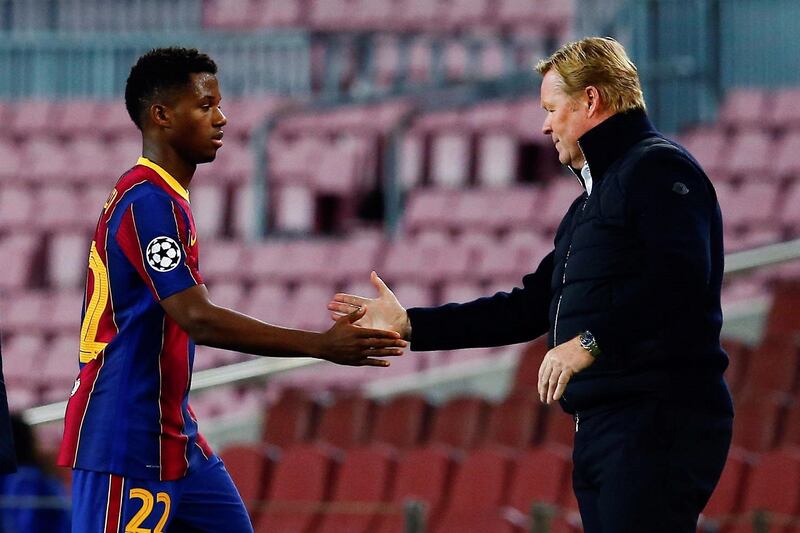 Koeman greets  Ansu Fati. EPA