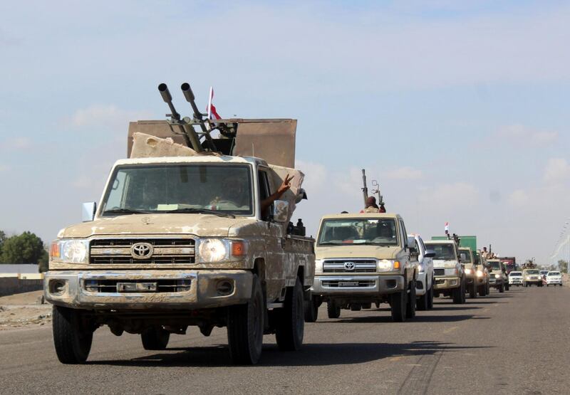 A reinforcement convoy of Yemen's Security Belt Force dominated by members of the the Southern Transitional Council (STC) seeking independence for southern Yemen, heads from the southern city of Aden to Abyan province on November 26, 2019, amid tensions with the forces of Saudi-backed President Abedrabbo Mansour Hadi. Saudi Arabia brokered on November 5 a power sharing agreement between Yemen's internationally recognised government and southern separatists of the STC, in a bid to end infighting that had distracted the Riyadh-led coalition from its battle against the Iran-backed Huthi rebels. / AFP / Saleh Al-OBEIDI
