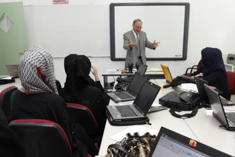 Sharjah, 4th October 2010.  Dr Farid Ohan (Director of Higher Colleges of Technology) talks to the social work class as he made a surprise visit, at Sharjah Women's College-Higher Colleges of Technology.  (Jeffrey E Biteng / The National) 