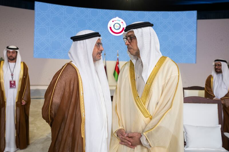 Dr Anwar Gargash, diplomatic adviser to the President, speaks to Sheikh Mansour bin Zayed, Vice President, Deputy Prime Minister and Chairman of the Presidential Court, at the 44th GCC Summit in Qatar. Abdulla Al Neyadi / Presidential Court 