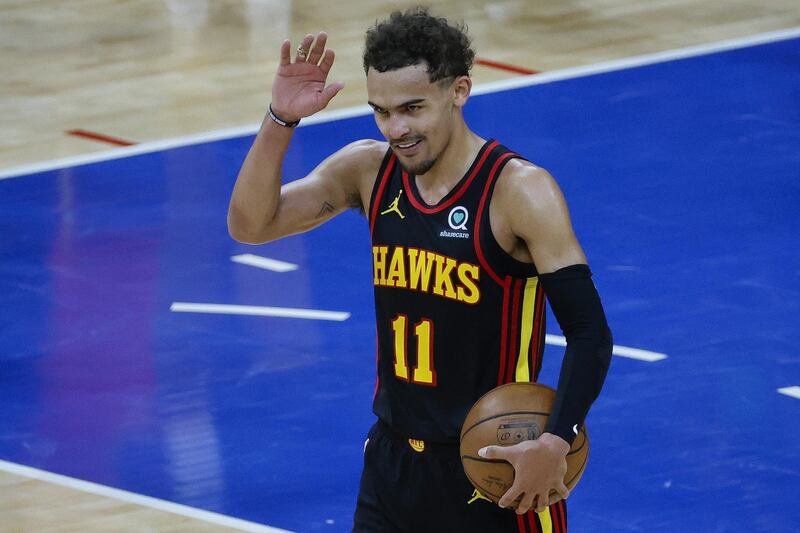 PHILADELPHIA, PENNSYLVANIA - JUNE 20: Trae Young #11 of the Atlanta Hawks celebrates after defeating the Philadelphia 76ers during Game Seven of the Eastern Conference Semifinals at Wells Fargo Center on June 20, 2021 in Philadelphia, Pennsylvania. NOTE TO USER: User expressly acknowledges and agrees that, by downloading and or using this photograph, User is consenting to the terms and conditions of the Getty Images License Agreement.   Tim Nwachukwu/Getty Images/AFP
== FOR NEWSPAPERS, INTERNET, TELCOS & TELEVISION USE ONLY ==
