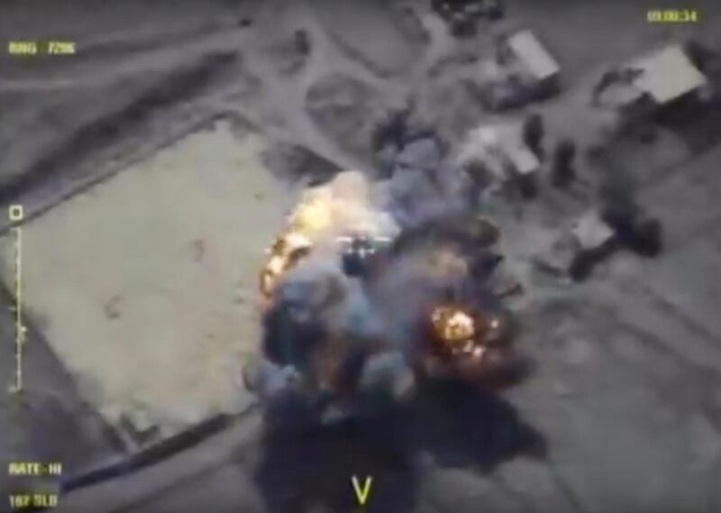 This frame grab provided on Tuesday, Sept. 26, 2017 by the Russian Defence Ministry press service shows militants positions being hit in the Idlib province of Syria as a result of air strikes conducted by Russians. (Russian Defence Ministry Press Service photo via AP)