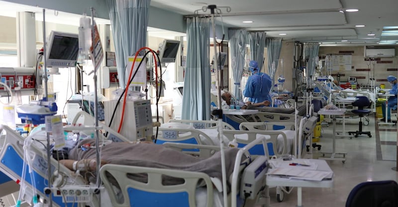 Patients with coronavirus disease (COVID-19) lie in beds at the ICU of Sasan Hospital, in Tehran, Iran March 30, 2020. WANA (West Asia News Agency)/Ali Khara via REUTERS ATTENTION EDITORS - THIS PICTURE WAS PROVIDED BY A THIRD PARTY