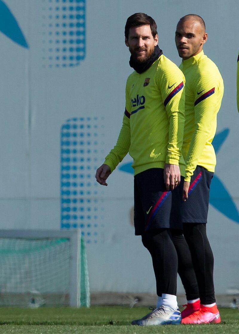 Barcelona's Martin Braithwaite and Lionel Messi during training on the eve of their match against Eibar. EPA
