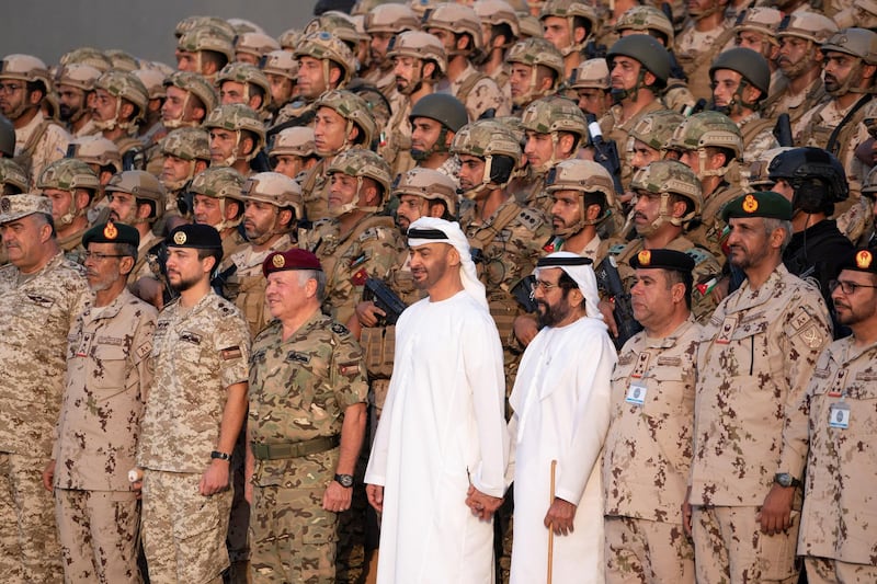 AL DHAFRA REGION, ABU DHABI, UNITED ARAB EMIRATES - June 26, 2019: HE Lt General Hamad Thani Al Romaithi, Chief of Staff UAE Armed Forces (front row 2nd L), HRH Hussein bin Abdullah, Crown Prince of Jordan (front row 3rd L), HM King Abdullah II, King of Jordan (front row 4th L), HH Sheikh Mohamed bin Zayed Al Nahyan, Crown Prince of Abu Dhabi and Deputy Supreme Commander of the UAE Armed Forces (front row 5th L), HH Sheikh Tahnoon bin Mohamed Al Nahyan, Ruler's Representative in Al Ain Region (front row 6th L) and HE Brigadier General Saleh Mohamed Saleh Al Ameri, Commander of the UAE Ground Forces (front row 8th L), stand for a photograph with members of the UAE Armed Forces and the Jordanian Armed Forces, after a joint military drill, Titled ‘Bonds of Strength’, at Al Hamra Camp.

( Mohamed Al Hammadi / Ministry of Presidential Affairs )
---