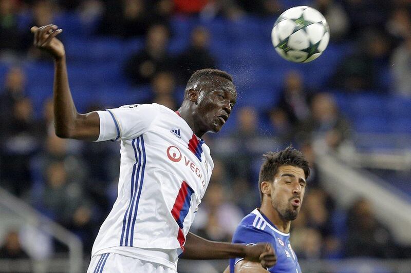 Lyon’s Mouctar Diakhaby, left, and Juventus’ Sami Khedira battle for the ball. Laurent Cipriani / AP Photo
