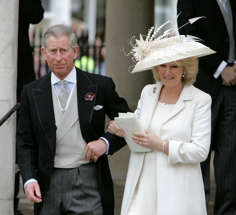 The queen consort after marrying Prince Charles, wears an Anna Valentine set for her civil ceremony at The Guildhall, Windsor on April 9, 2005. Getty Images