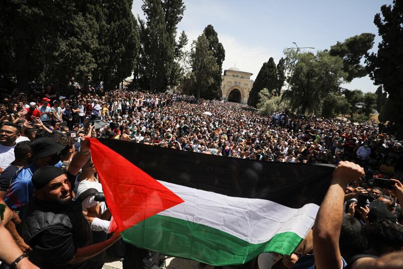 Palestinians gather after performing the last Friday prayers of Ramadan to protest over the possible eviction of several Palestinian families from homes on land claimed by Jewish settlers in the Sheikh Jarrah neighbourhood, in Jerusalem's Old City. Reuters