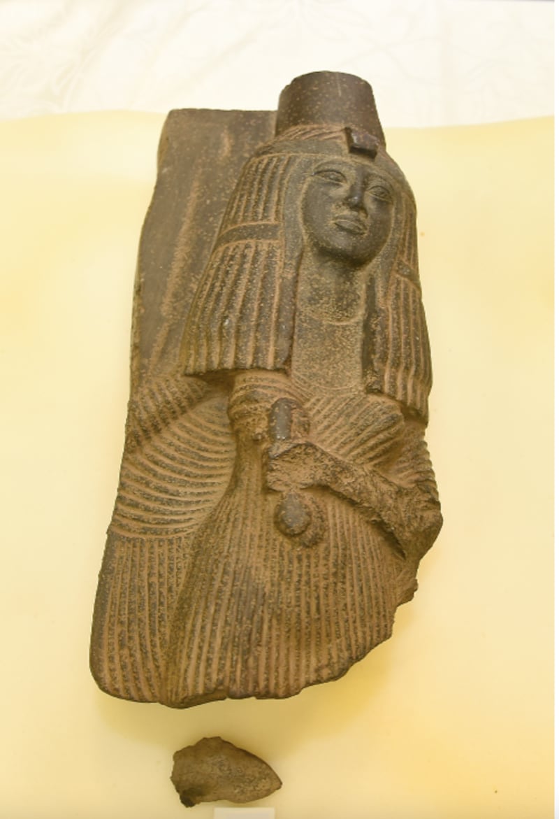 A figurine of a woman from the Pharaonic age.