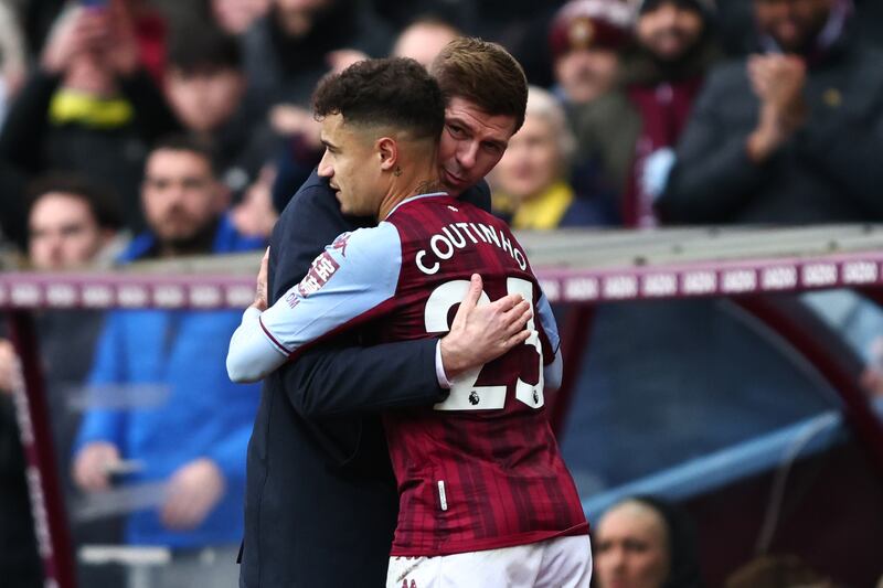 BIRMINGHAM, ENGLAND - MARCH 05:  Aston Villa manager Steven Gerrard embraces Philippe Coutinho during the Premier League match between Aston Villa and Southampton at Villa Park on March 5, 2022 in Birmingham, United Kingdom. (Photo by Marc Atkins / Getty Images)
