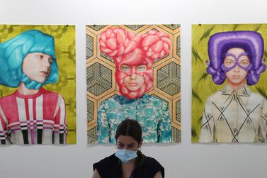 Paintings by Angeles Agrela at Art Dubai at Dubai International Financial Centre, which featured 50 galleries with a focus on modern and contemporary art. Kamran Jebreili / AP