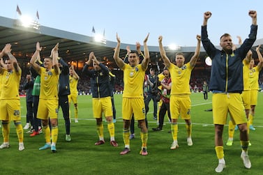 Ukraine players celebrate after the FIFA World Cup 2022 qualification playoff semi final soccer match between Scotland and Ukraine at Hampden Park in Glasgow, Scotland, Britain, 01 June 2022.   EPA / Robert Perry