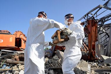 French UN peacekeepers work and clean-up the port of Beirut on September 30. EPA