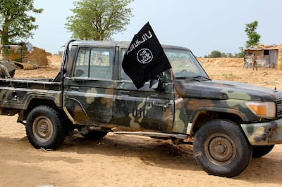 A vehicle allegedly belonging to the Islamic State group in West Africa (ISWAP) is seen in Baga on August 2, 2019. Intense fighting between a regional force and the Islamic State group in West Africa (ISWAP) has resulted in dozens of deaths, including at least 25 soldiers and more than 40 jihadists, in northeastern Nigeria.
ISWAP broke away from Boko Haram in 2016 in part due to its rejection of indiscriminate attacks on civilians. Last year the group witnessed a reported takeover by more hardline fighters who sidelined its leader and executed his deputy. The IS-affiliate has since July 2018 ratcheted up a campaign of attacks against military targets. / AFP / AUDU MARTE
