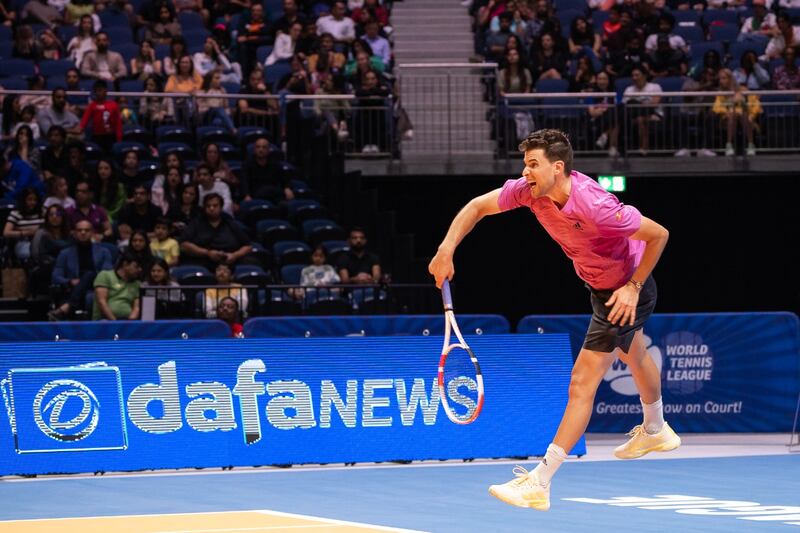 Dominic Thiem, of team Hawks, serves against Felix Auger-Aliassime, of the Kites, during their match at the World Tennis League at Coca-Cola Arena, in Dubai on Thursday, December  22, 2022. Photo: World Tennis League
