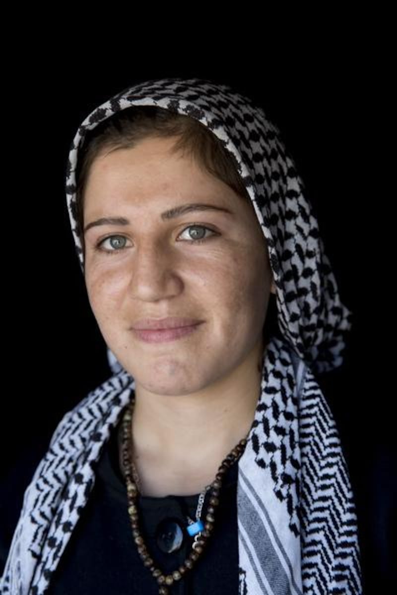 Orin Wali, 18, from Boras village in Kobani. ‘My mother put this [star] tattoo on my chin when I was just a baby. She told me it’s because I had a wide face.’