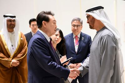 President Sheikh Mohamed greets Yoon Suk Yeol, President of South Korea, in Abu Dhabi in January 2023. The two countries have close business ties. Hamad Al Kaabi / Presidential Court