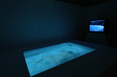 'Under the Water' (2004), a video installation looped in a swimming pool, by Hassan Meer, a leading member of Omani group The Circle. Photo: Hassan Meer