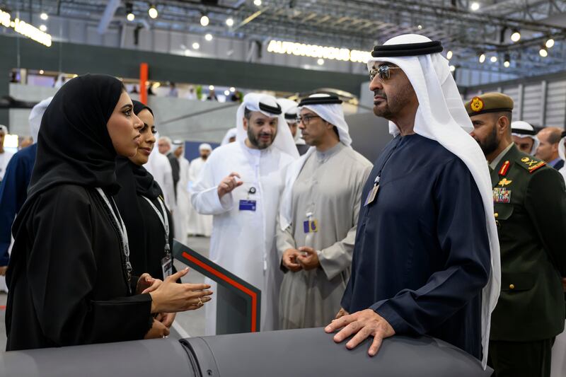 President Sheikh Mohamed with exhibitors at the airshow. Hamad Al Kaabi / UAE Presidential Court 