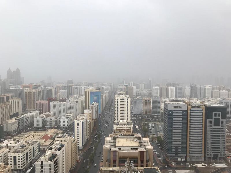 Rain is over downtown Abu Dhabi. Charlie Mitchell / The National