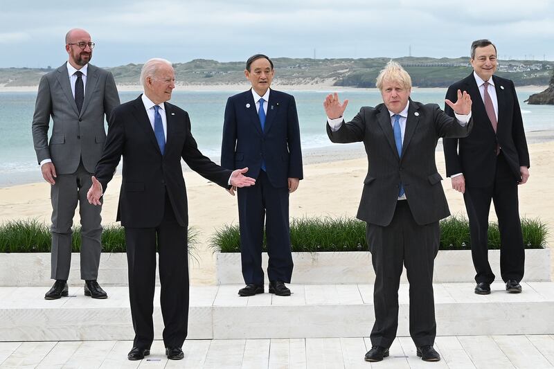 The British prime minister with US President Joe Biden, European Council President Charles Michel, former Japanese prime minister Yoshihide Suga and Italian Prime Minister Mario Draghi during the G7 Summit in Cornwall, in June 2021. Getty Images