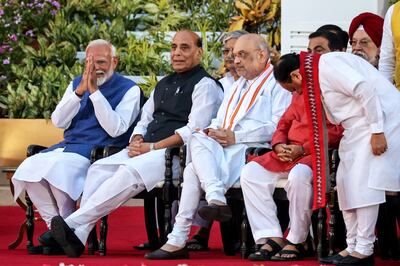 Prime Minister Narendra Modi, left, fold hands and thanks cabinet ministers Rajnath Singh, Amit Shah, Nitin Gadkari, and Jagat Prakash Nadda during the swearing-in ceremony at the presidential palace in New Delhi. EPA