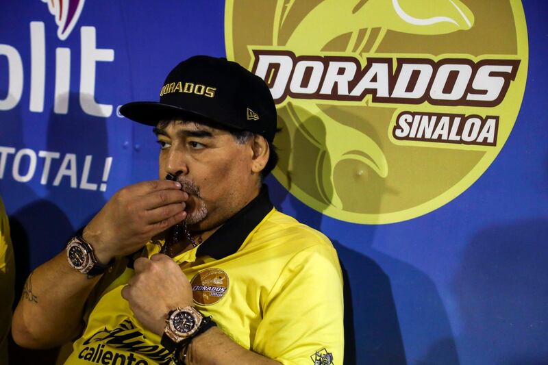 Maradona sanctifies himself before the match. AFP