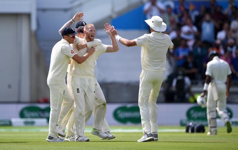 England all-rounder Ben Stokes celebrates with Sam Curran and Stuart Broad after dismissing Hardik Pandya. Getty Images
