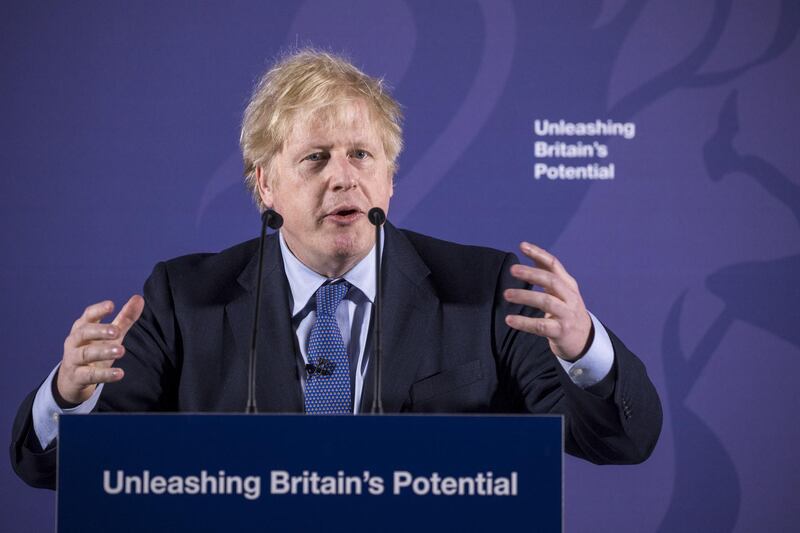 epa08190341 British Prime Minister Boris Johnson gestures as he delivers a speech on 'Unleashing Britain's Potential' at the Old Royal Naval College in London, Britain, 03 February 2020.  The United Kingdom officially left the EU on 31 January 2020, beginning an eleven month transition period with negotiations over a future trade deal.  EPA/Jason Alden / POOL