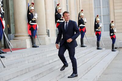 French President Emmanuel Macron leaves after delivering a joint statement with French Foreign Affairs Minister Jean-Yves Le Drian, International Organization for Migration Director-General Antonio Vitorino, French Interior Minister Christophe Castaner, European Commissioner for Migration and Home Affairs Dimitris Avramopoulos and UN High Commissioner for Refugees Filippo Grandi at the Elysee Palace in Paris, France July 22, 2019.  REUTERS/Philippe Wojazer