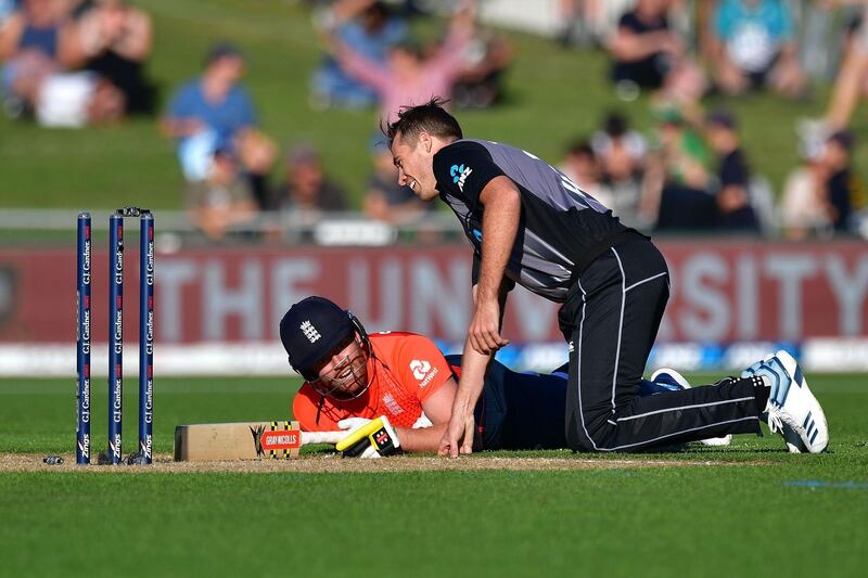 New Zealand's Tim Southee tries to run out England batsman Jonny Bairstow. AFP