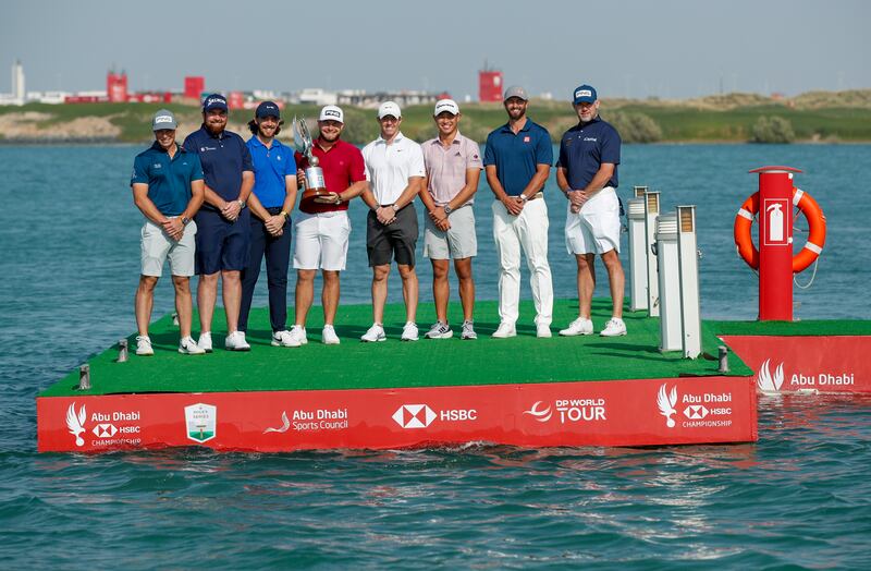 From left: Viktor Hovland of Norway, Shane Lowry of Ireland, Tommy Fleetwood of England, Tyrrell Hatton of England, Rory McIlroy of Northern Ireland, Collin Morikawa of the USA, Adam Scott of Australia and Lee Westwood of England pose for a photo. Getty Images