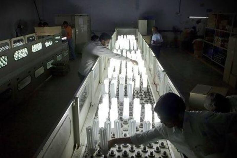 A light bulb factory in Nasik. India's growth rate is predicted to have fallen to 5 per cent. Kuni Takahashi / Bloomberg News