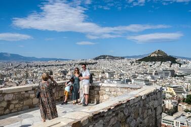 Tourists at the Acropolis in Athens. Greece would welcome visitors with proof of inoculation. Getty Images