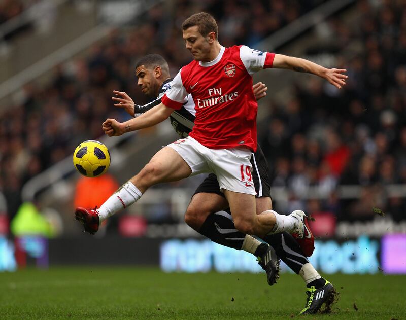 NEWCASTLE UPON TYNE, ENGLAND - FEBRUARY 05:  Jack Wilshire of Arsenal battles with Leon Best of Newcastle during the Barclays Premier League match between Newcastle United and Arsenal at St James' Park on February 5, 2011 in Newcastle upon Tyne, England.  (Photo by Richard Heathcote/Getty Images) *** Local Caption ***  GYI0063322129.jpg
