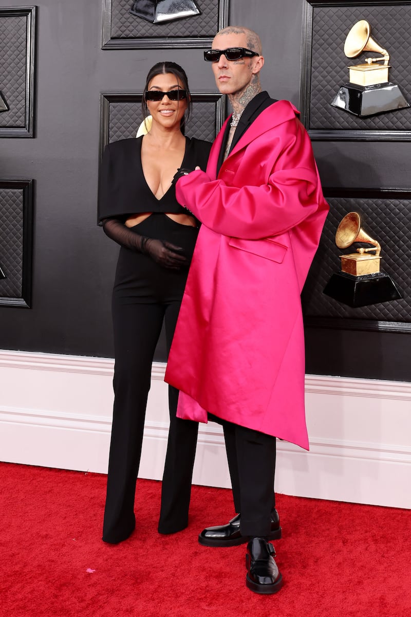 Kourtney Kardashian and her husband Travis Barker attending the Grammy Awards in April. Getty