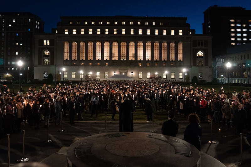 Hundreds attend a December 3, 2021 candlelight vigil for Columbia University graduate student Davide Giri, who was killed in Central Park while cycling home. Getty / AFP